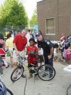 Councillor Ainslie at the Unveiling of Rose Community Gardens at Storefront and Bike Safety Event August 11th, 2008